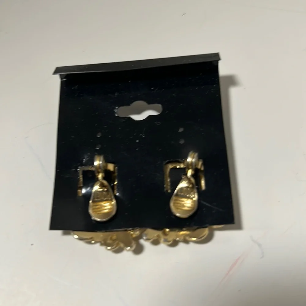 Monet gold tone shiny earrings clip filigree retro power dressing chunky barque